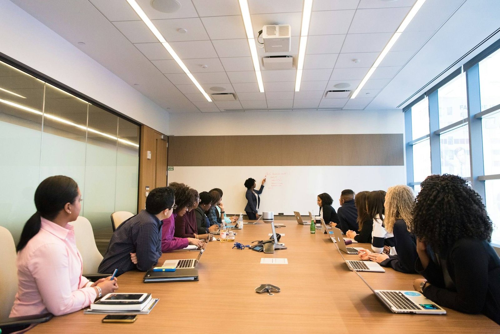 Team meeting around a long conference table