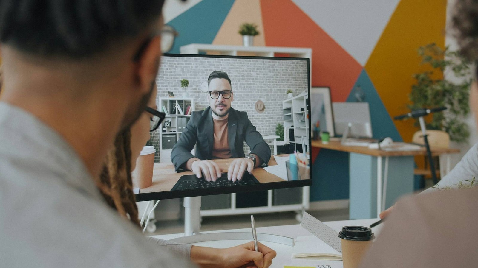 Person on a video call at a desk